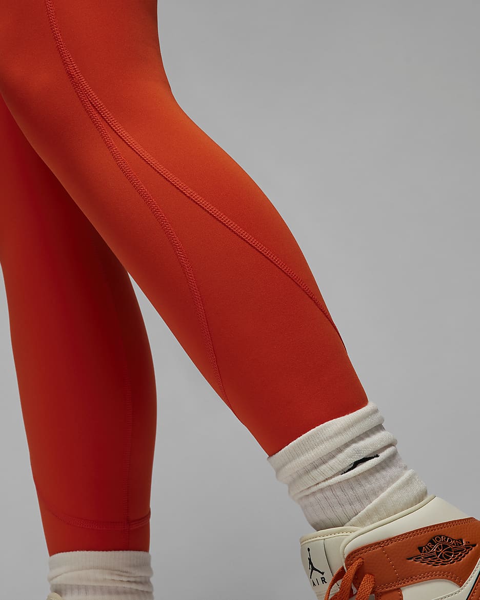 Orange and black nike leggings top